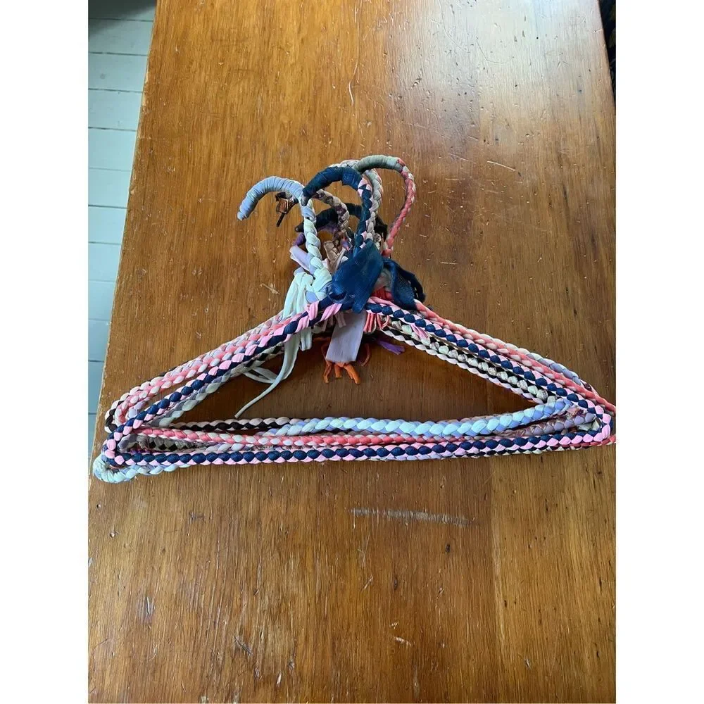 Bundle of vintage woven multicolor hangers